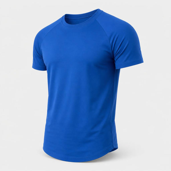 PrimeBuild Essential Training Tee in blue, three-quarter front view showing the raglan sleeves and curved hem