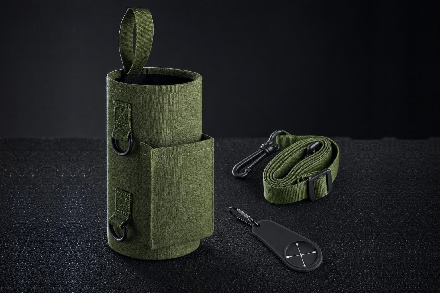 Army green magnetic bottle holder with its strap and towel holder on a dark surface