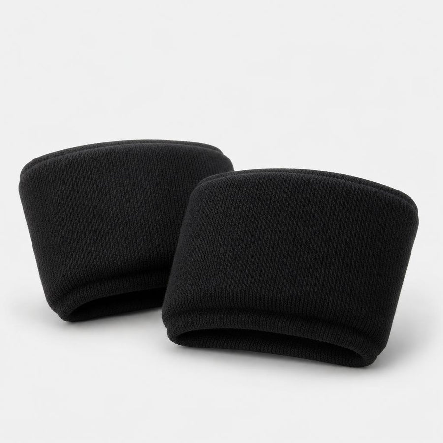 PrimeBuild Boxing Gel Knuckle Guards, two black ribbed-knit slip-on knuckle pads on a light gray background