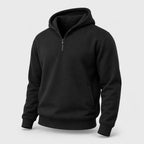 PrimeBuild Men's Quarter Zip Fleece Hoodie in black, angled front view with partly open zip, hood, side pocket and ribbed hem