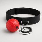 PrimeBuild Boxing Reflex Ball Set: red dimpled ball on a black elastic cord and black headband with metal D-ring