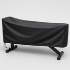 Black PrimeBuild Waterproof Weight Bench Cover fitted over a weight bench, drawcord toggle at the hem