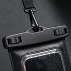 PrimeBuild IPX8 Waterproof Phone Pouch close-up of the double slide-lock top seal and swivel clip with water droplets