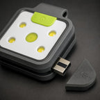 Close-up of the PrimeBuild Clip-On Running Light with the side cap removed to show the built-in USB plug