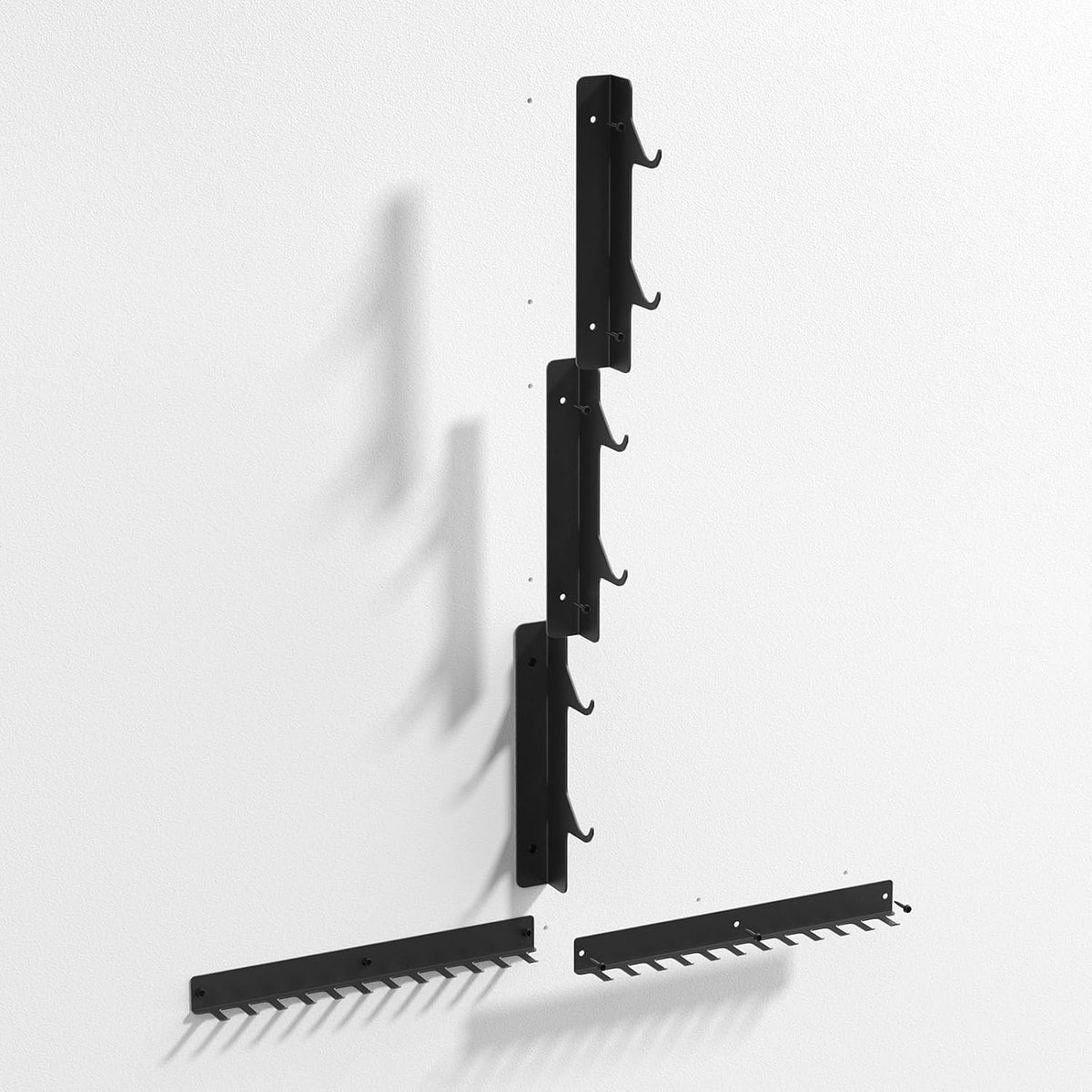 Empty black wall rack shown from the side: vertical upright sections with hooks and two horizontal hook strips