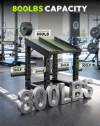 Dumbbell rack holding adjustable dumbbells and plates