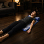 Acupressure Mat & Pillow Set – woman lying back on the blue mat with her neck on the pillow